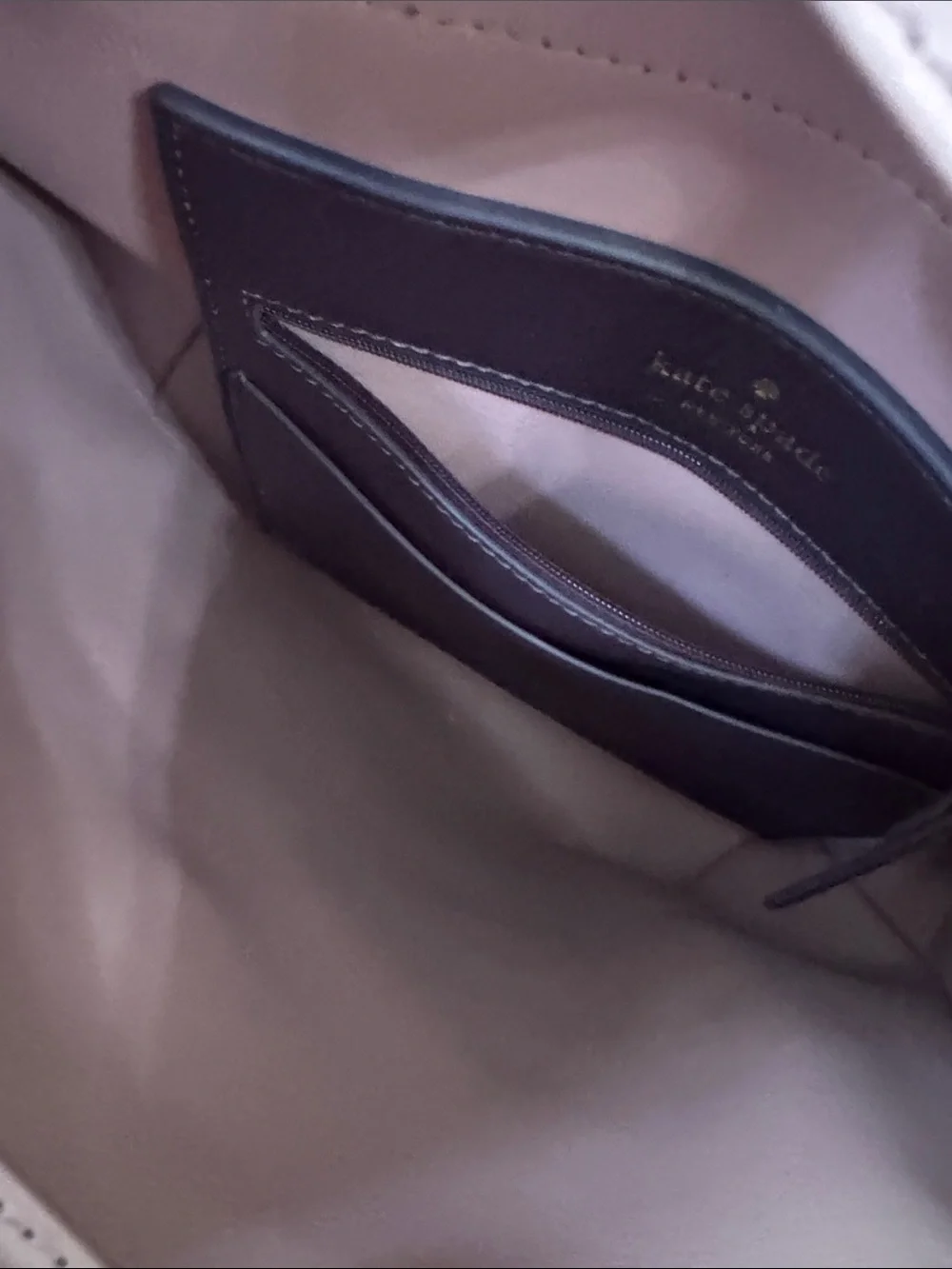 kate spade Plum and Blush Leather Tassel Backpack